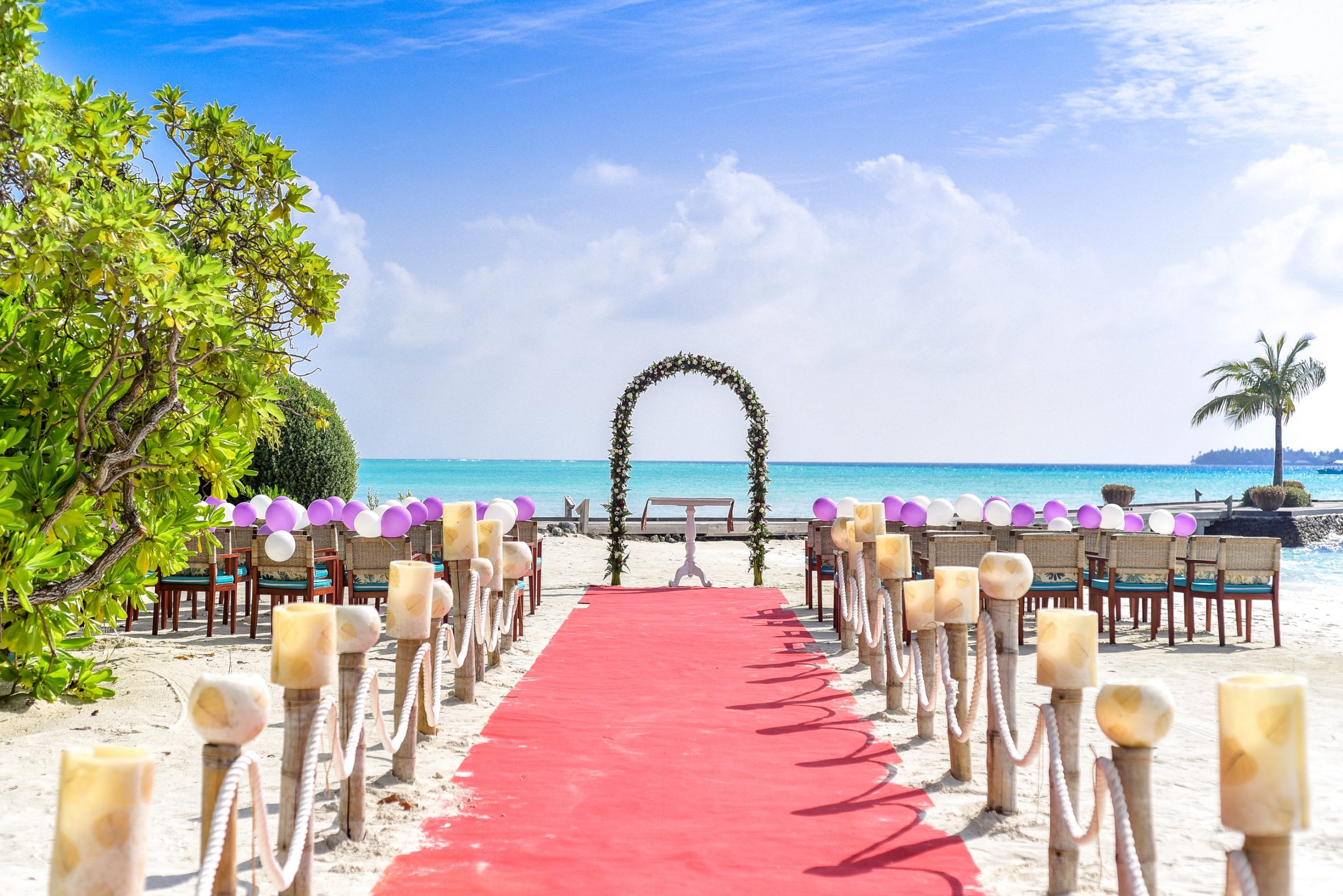 https://weddingdc.net/wp-content/uploads/2020/04/beach-wedding-event-under-white-clouds-and-clear-sky-during-169211-1-scaled.jpg