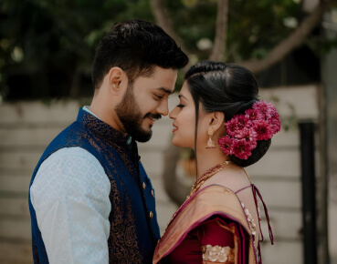 Mehul and Neha pose for a wedding portrait at their wedding in Bangalore