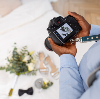 Wedding photographer capturing a couple’s ceremony