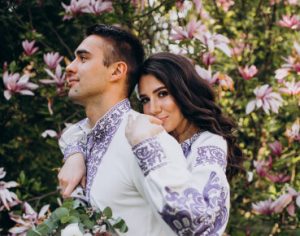 Vino and Shirin among pink blossoms at their wedding in Hyderabad, organised by our wedding planners