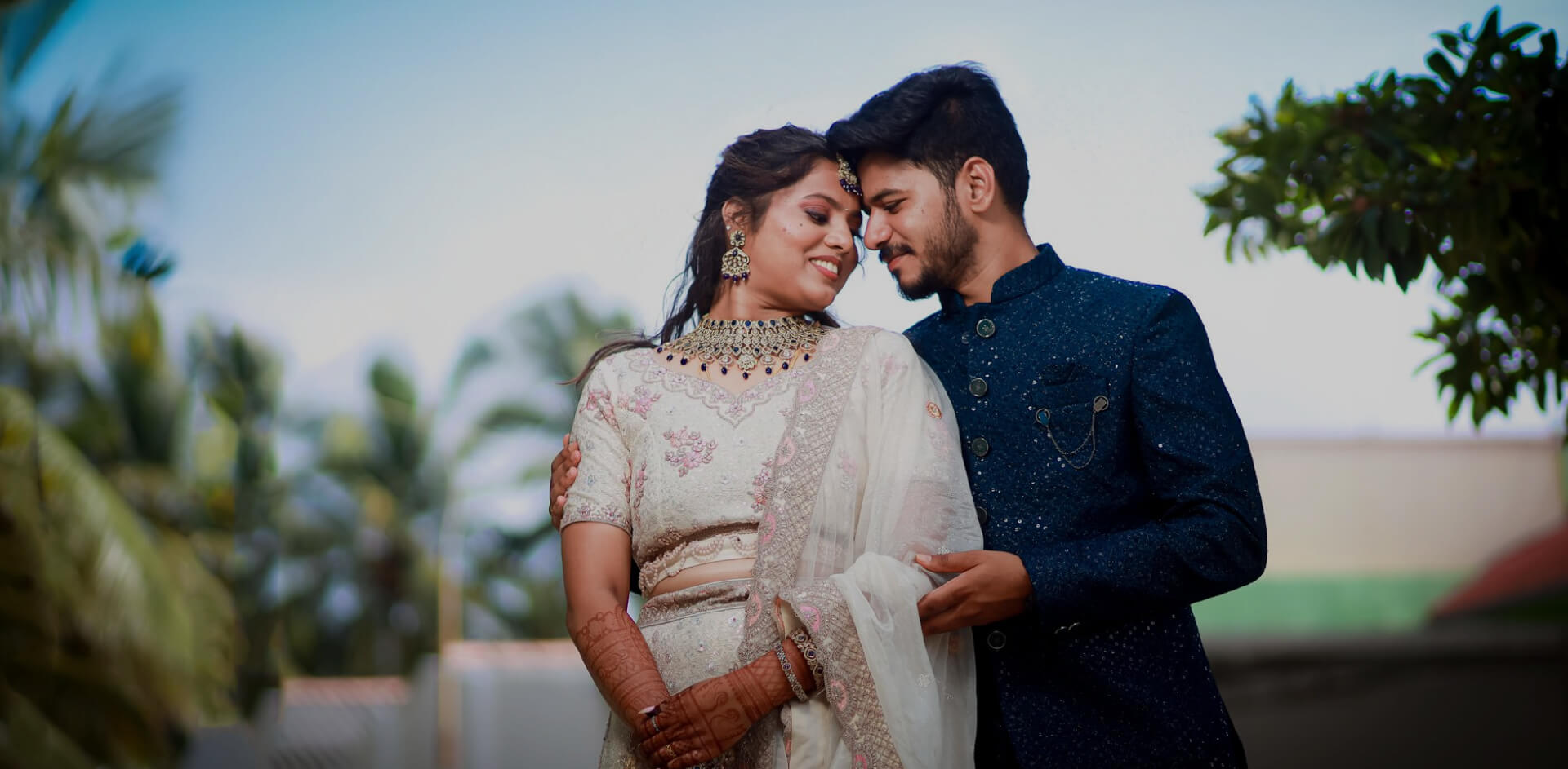 Couple at an outdoor pre-wedding photoshoot arranged by our wedding planners