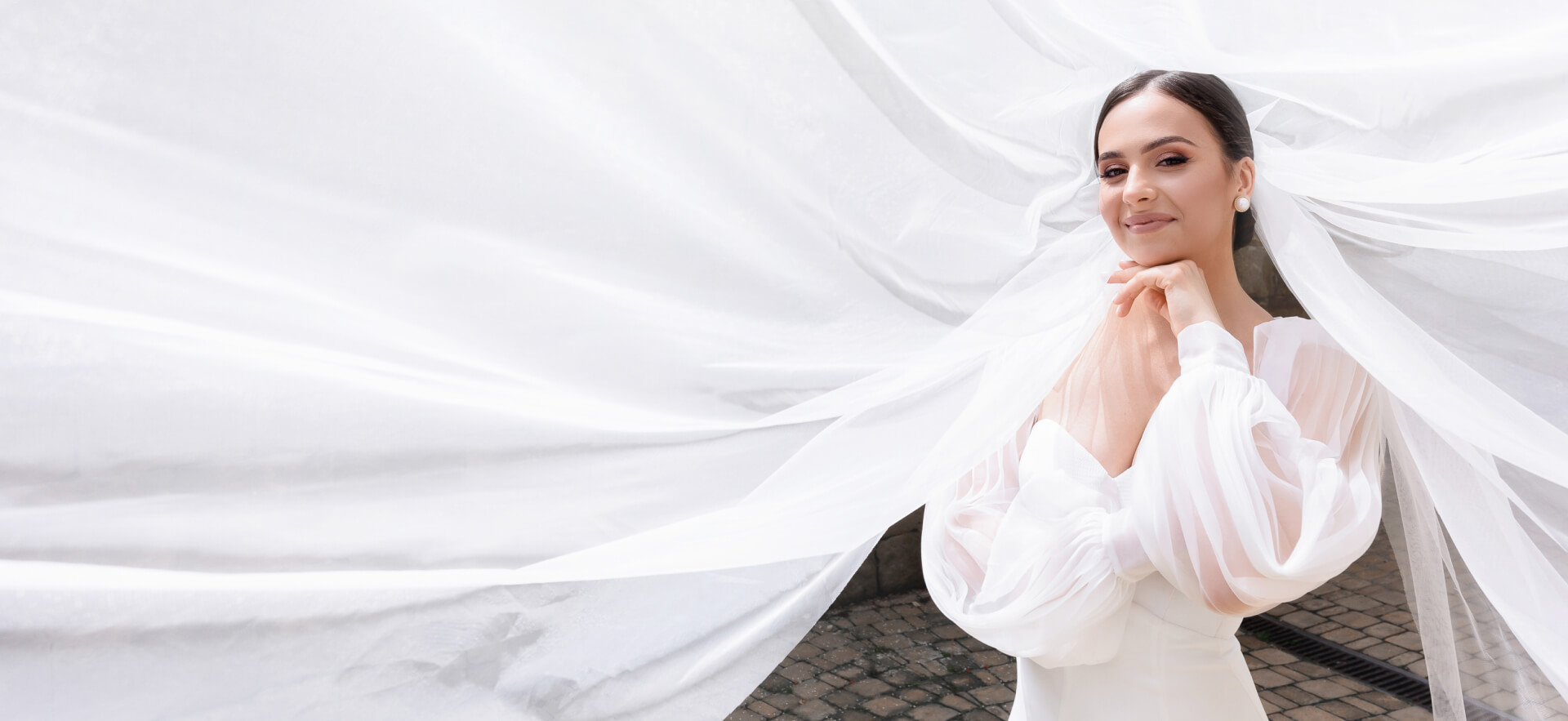 Bride in a white gown and veil